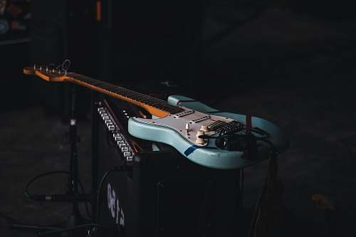 guitar teal and brown electric guitar leisure activities